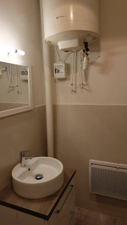 Salle d'eau avec chauffage